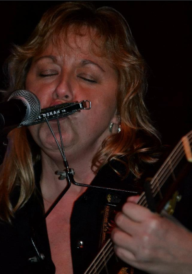 Sandy Pickett Playing Instruments